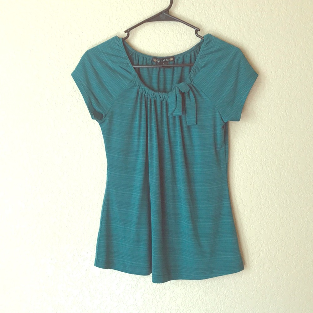 Green flowy shirt with a bow
